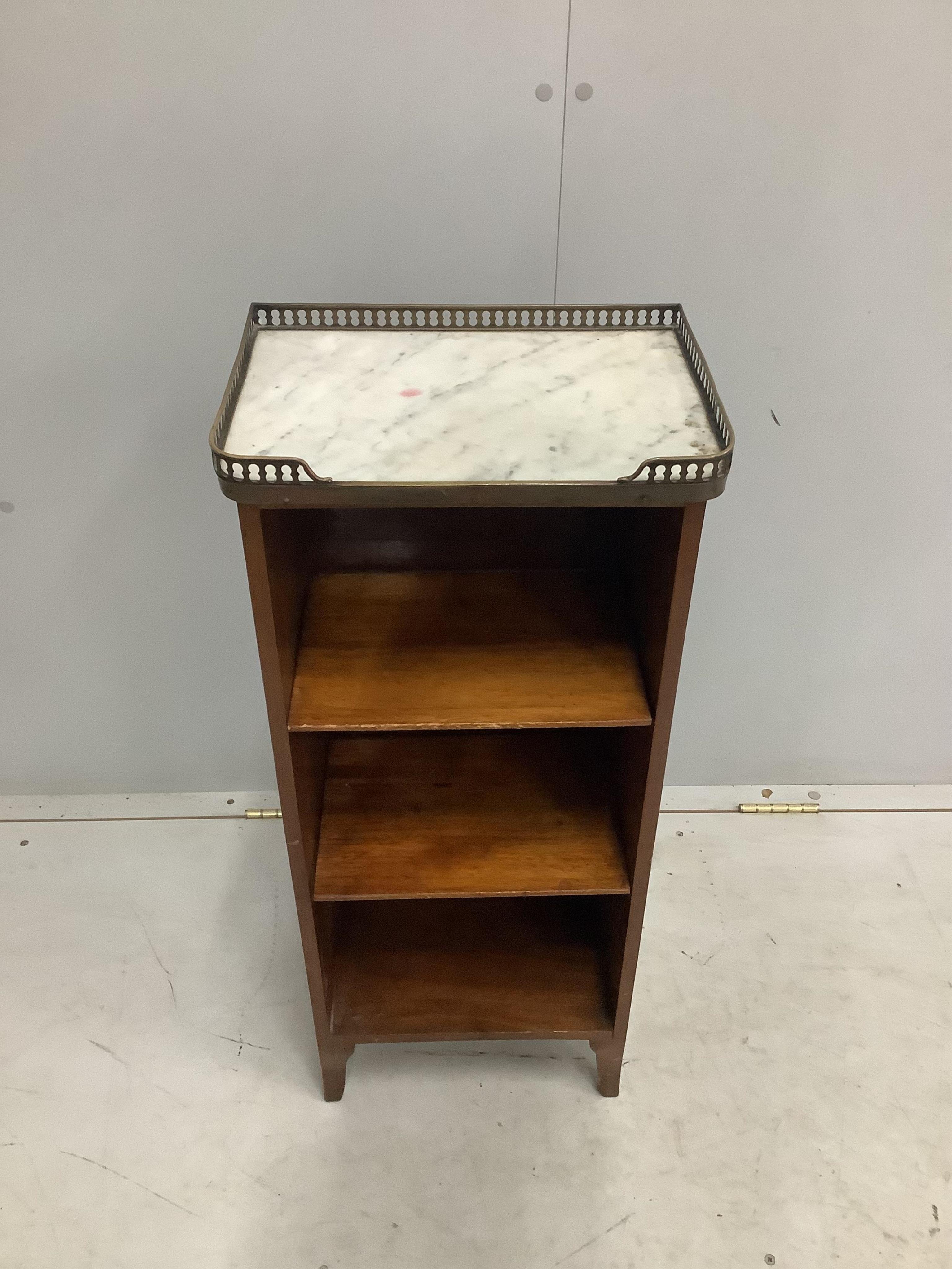 A small French marble topped open bookcase, width 34cm, depth 24cm, height 81cm. Condition - fair